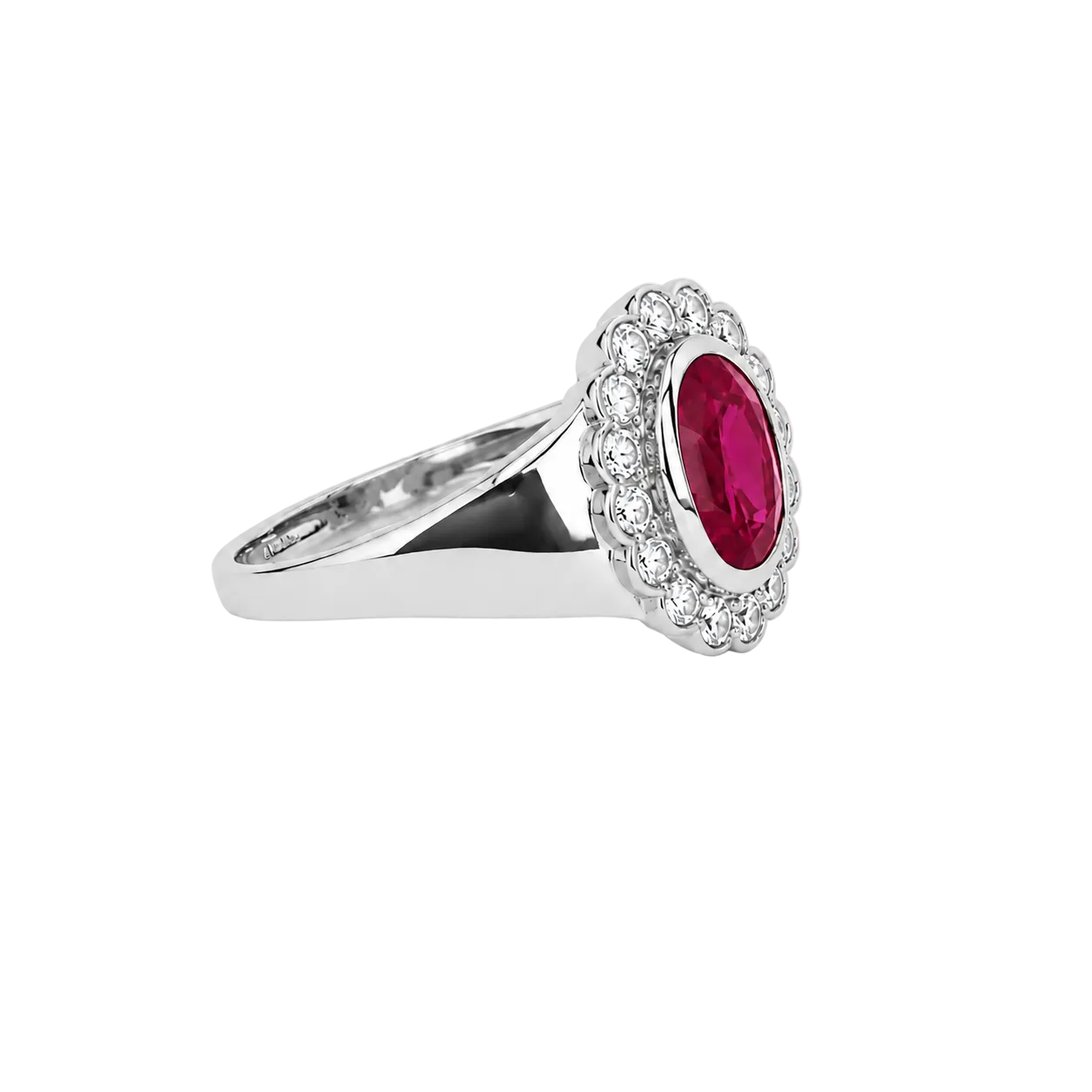 White gold ring with a red gemstone and diamond accents on a white background